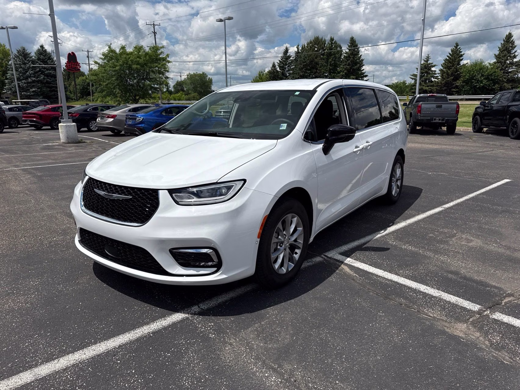 2024 Bright White Clearcoat Chrysler Pacifica Touring L AWD Van