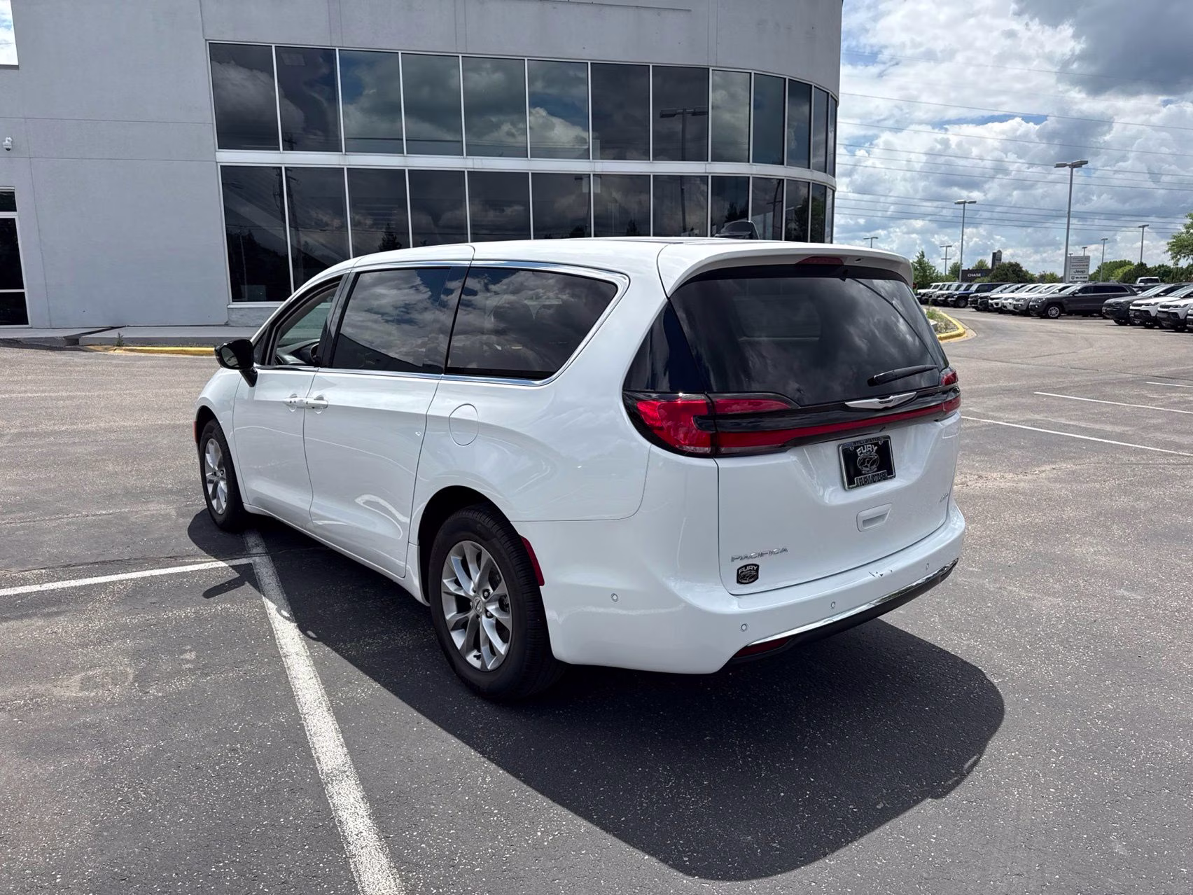 2024 Bright White Clearcoat Chrysler Pacifica Touring L AWD Van