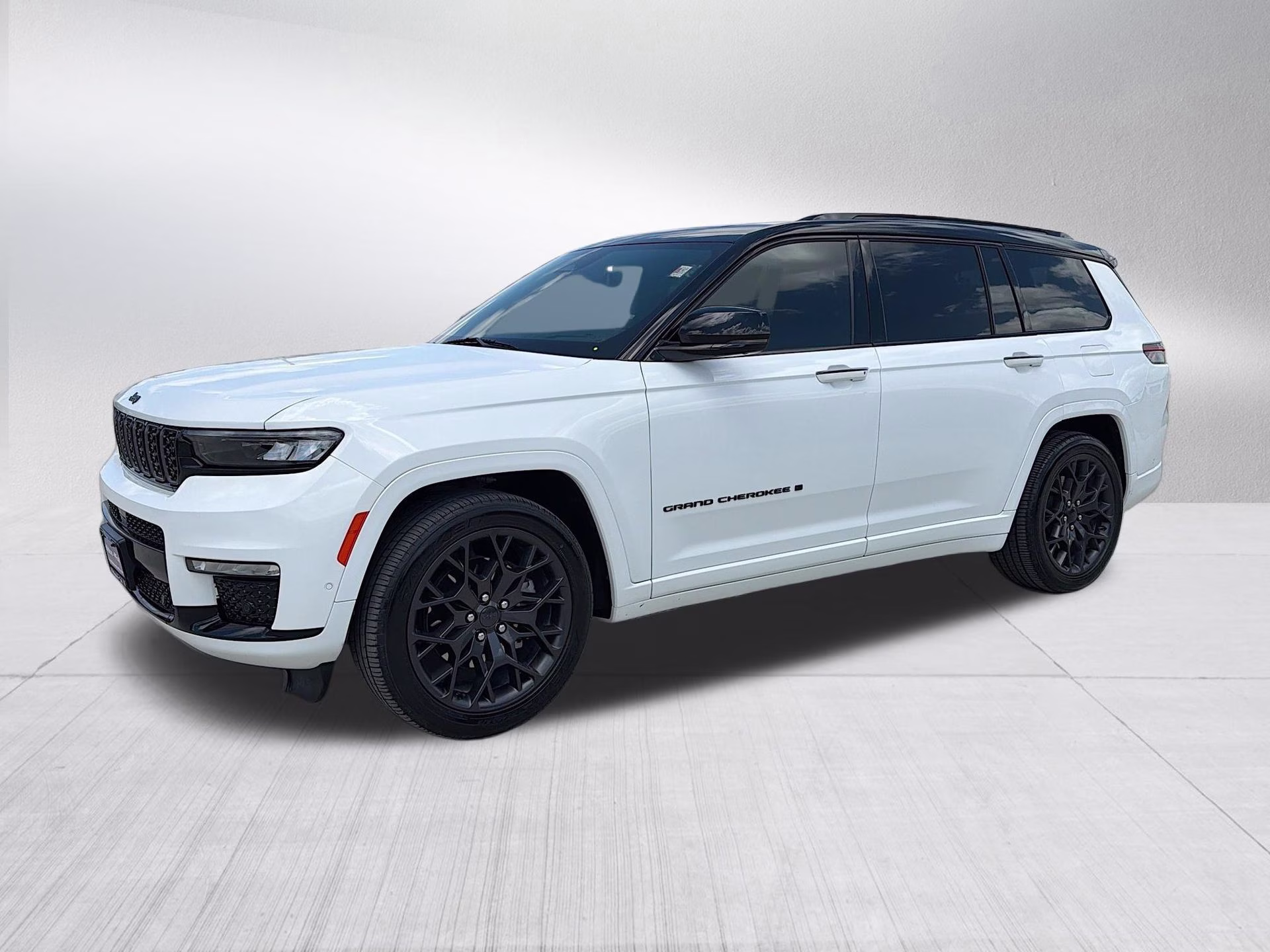 2023 Bright White Clearcoat Jeep Grand Cherokee L Summit 4X4 SUV