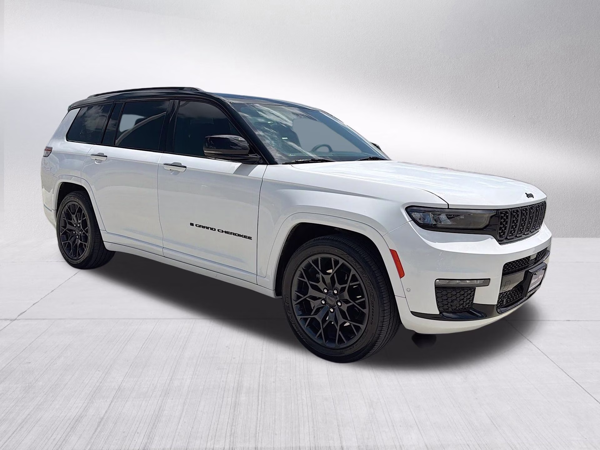 2023 Bright White Clearcoat Jeep Grand Cherokee L Summit 4X4 SUV