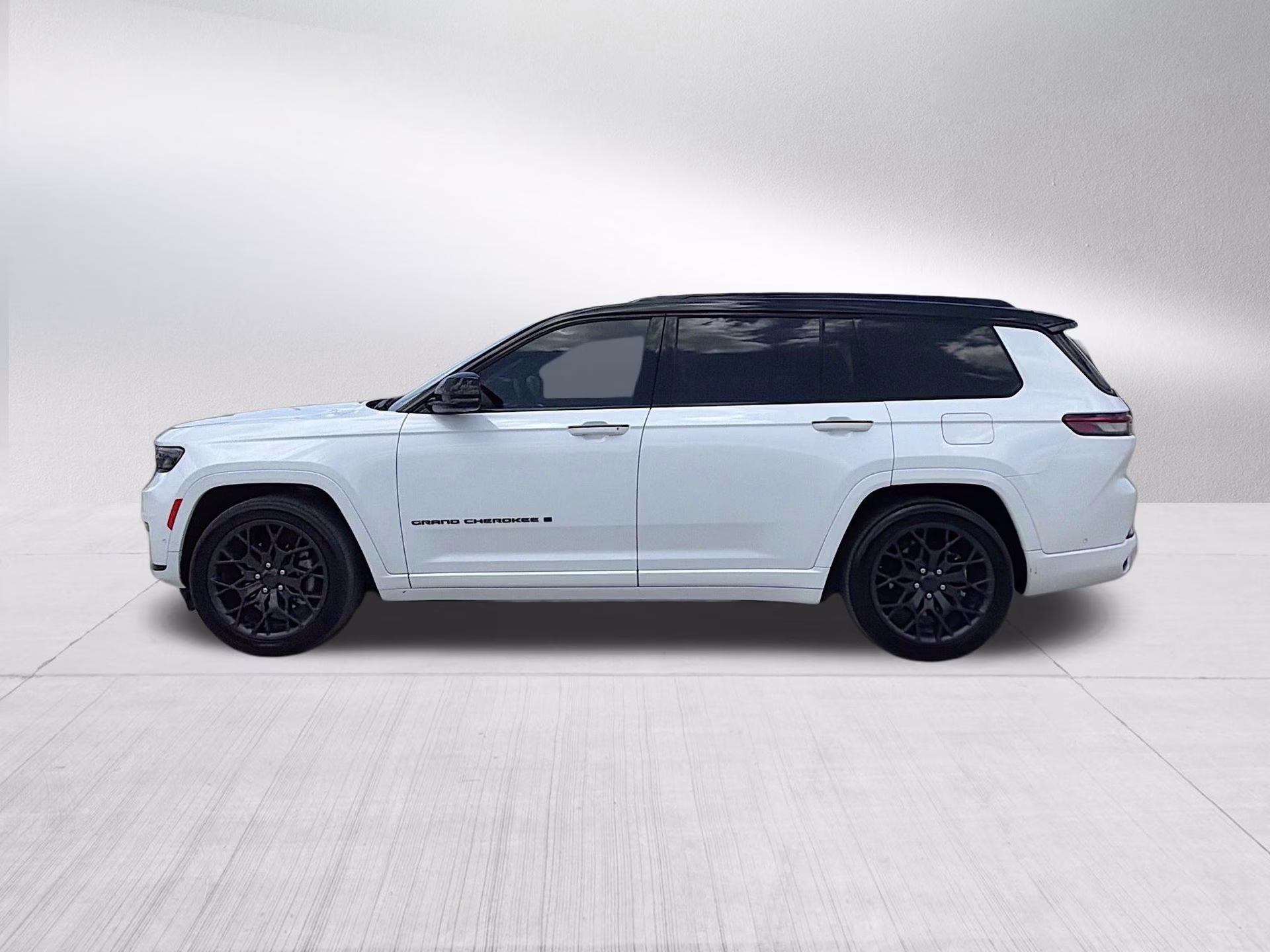 2023 Bright White Clearcoat Jeep Grand Cherokee L Summit 4X4 SUV