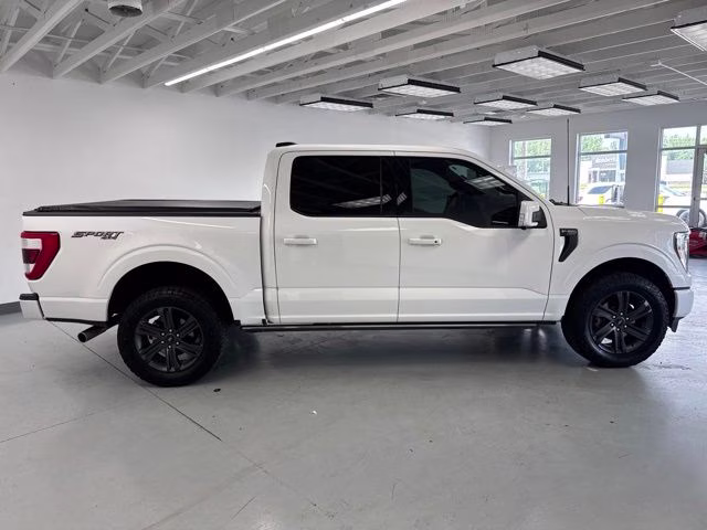 2023 Star White Metallic Tri-Coat Ford F-150 Lariat 4X4 Truck