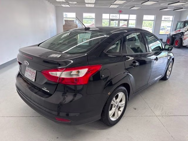 2014 Tuxedo Black Metallic Ford Focus SE FWD Sedan