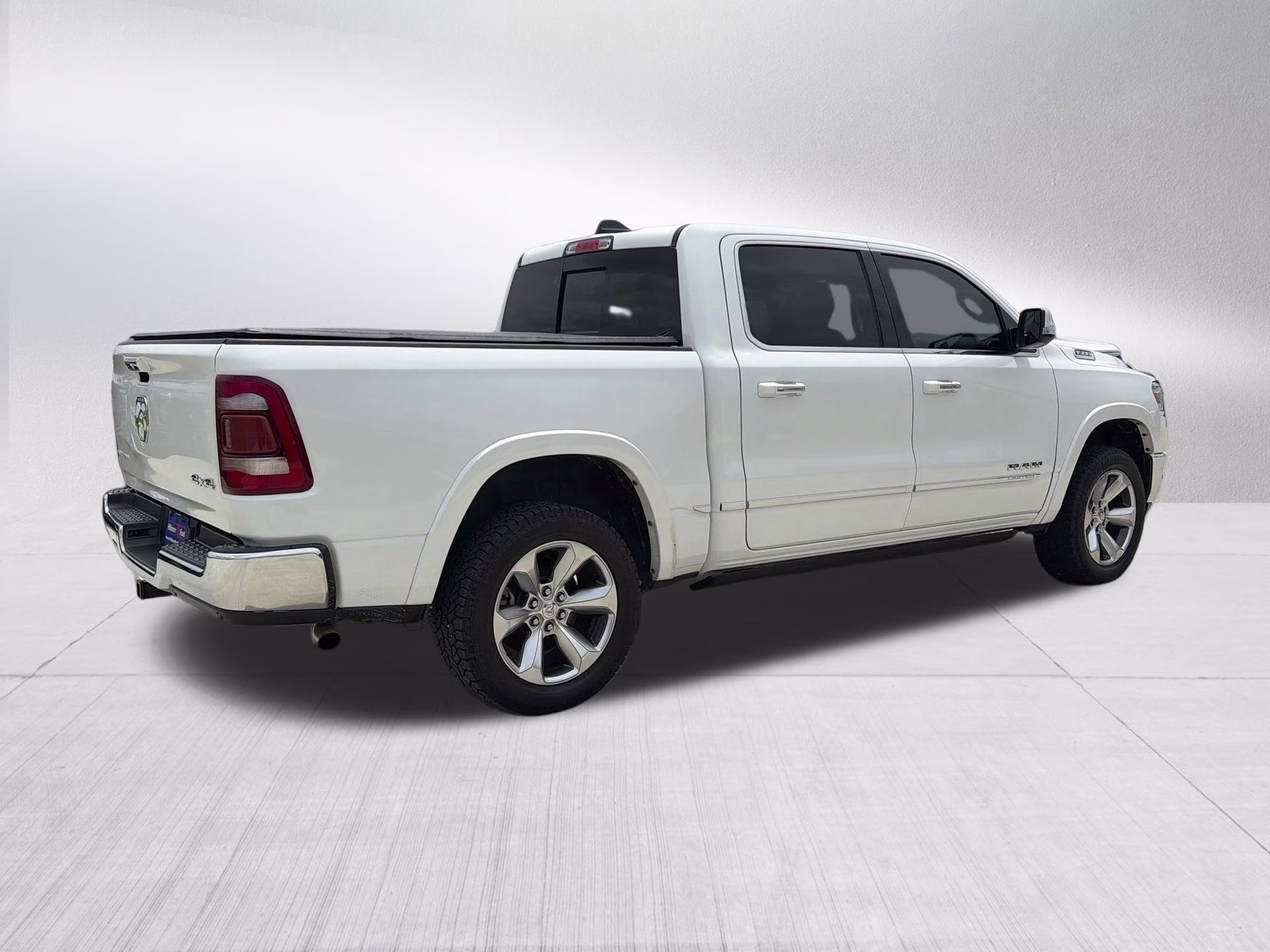 2019 Ivory White Tri-Coat Pearlcoat Ram 1500 Limited 4X4 Truck
