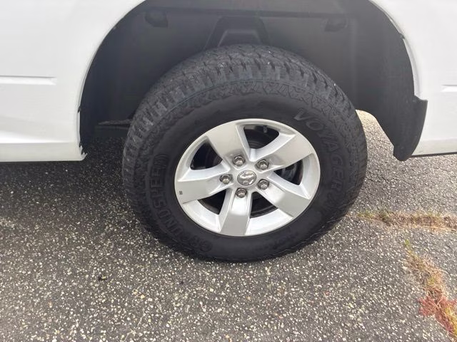 2023 Bright White Clearcoat Ram 1500 Classic SLT 4X4 Truck
