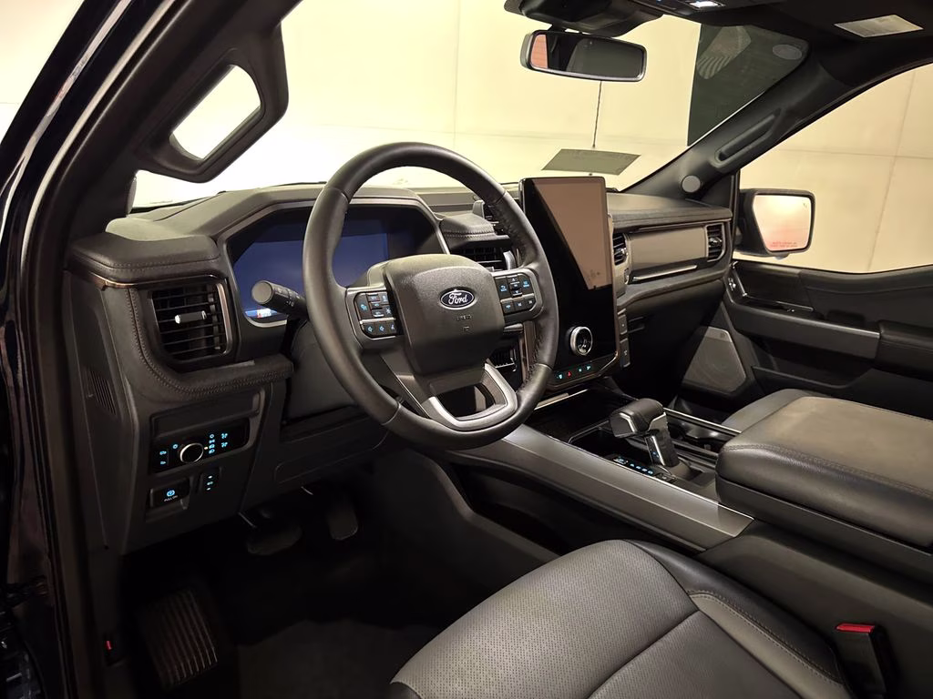 2025 Antimatter Blue Metallic Ford F-150 Lightning Lariat AWD Truck
