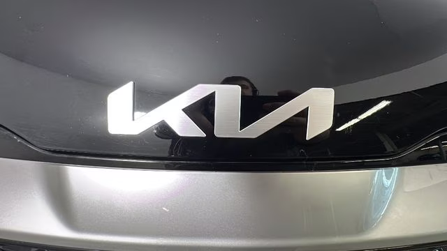 2025 Ebony Black Kia Sportage EX FWD SUV