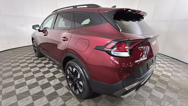 2024 Dawning Red Kia Sportage X-Line AWD SUV