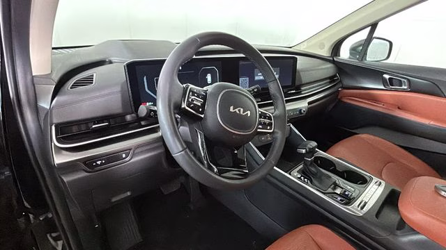 2025 Aurora Black Pearl Kia Carnival SX Prestige FWD Van
