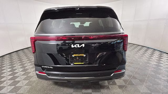 2025 Aurora Black Pearl Kia Carnival SX Prestige FWD Van