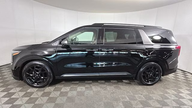 2025 Aurora Black Pearl Kia Carnival SX Prestige FWD Van