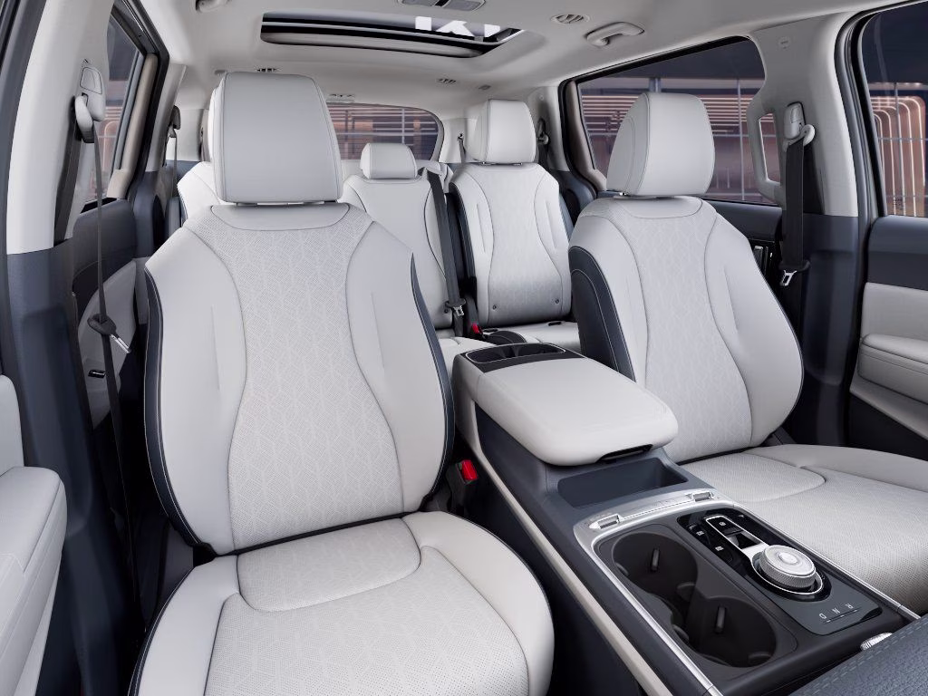 2026 Ceramic White Kia Carnival Hybrid SX FWD Van