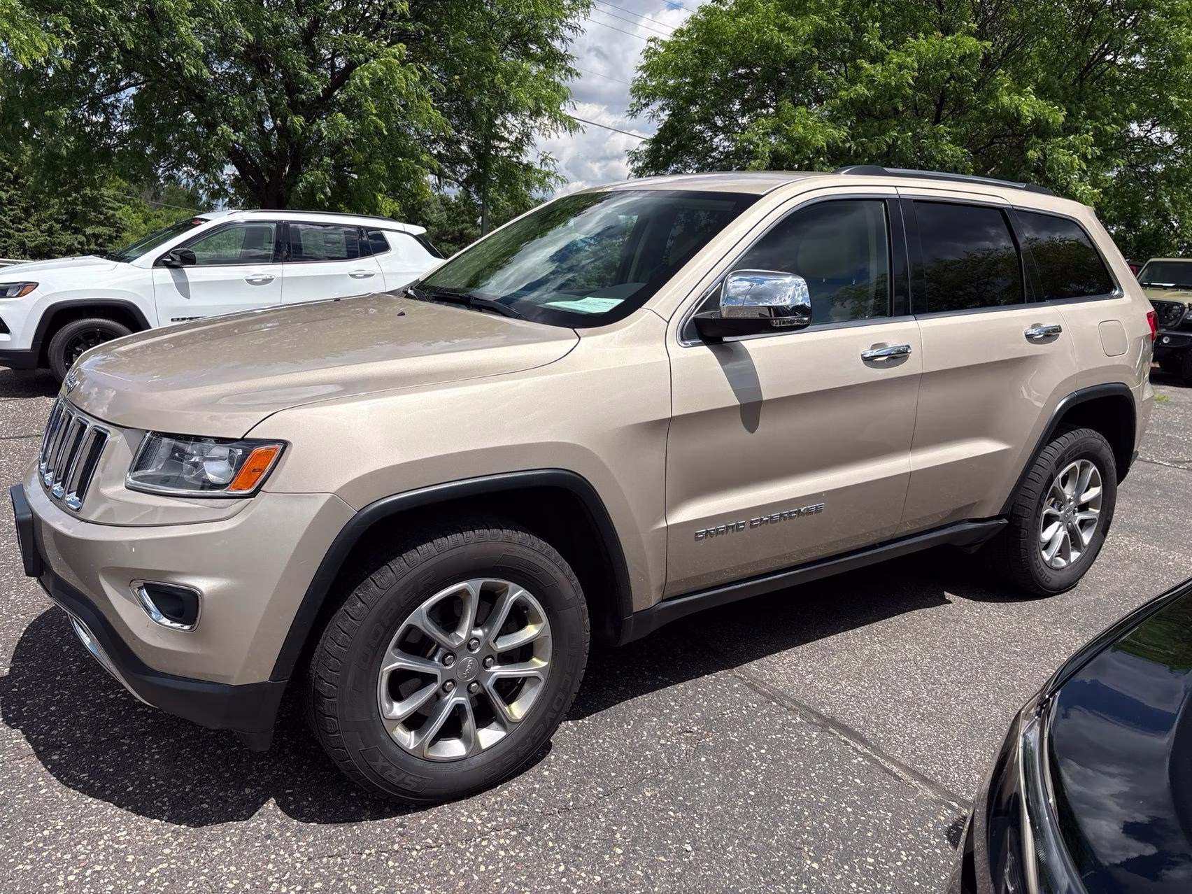 2015 Cashmere Pearlcoat Jeep Grand Cherokee Limited 4X4 SUV