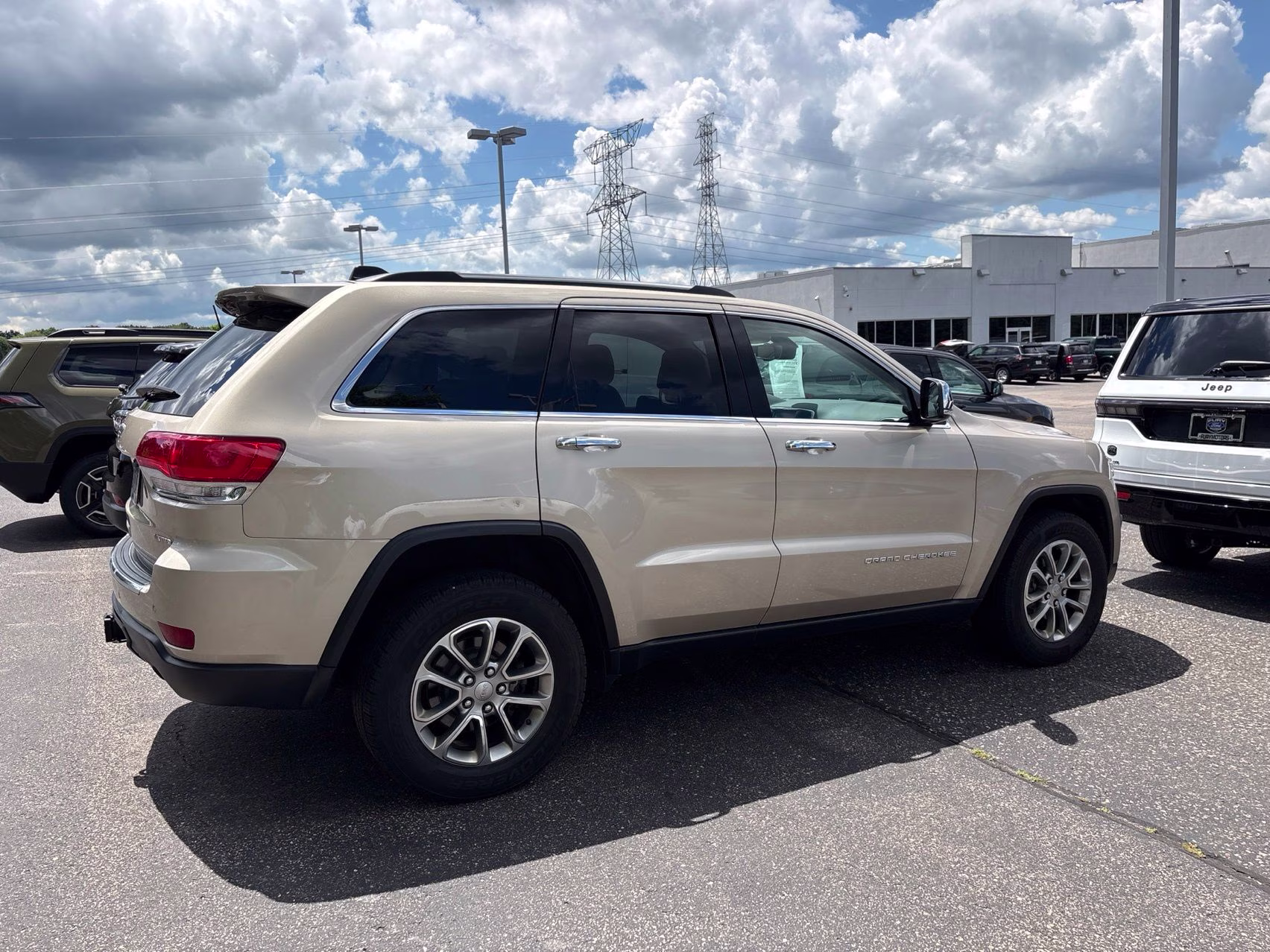 2015 Cashmere Pearlcoat Jeep Grand Cherokee Limited 4X4 SUV
