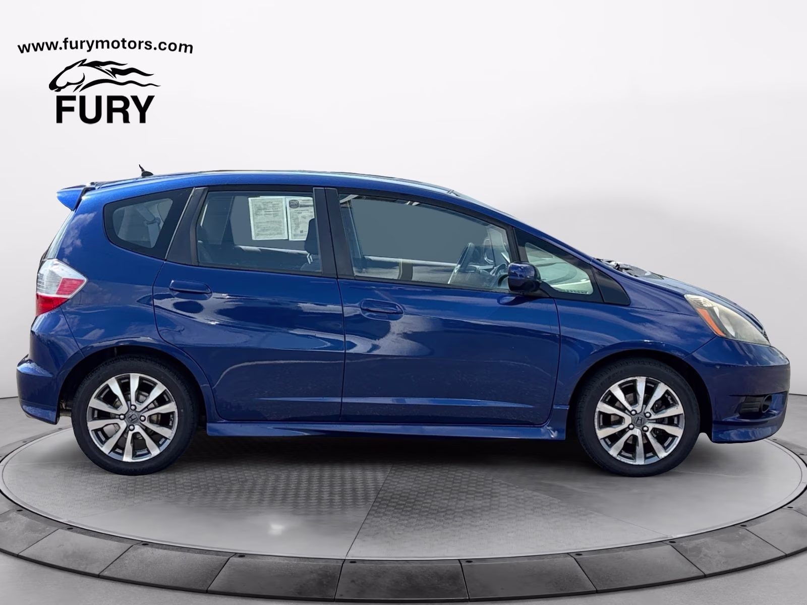 2012 Blue Honda Fit Sport FWD Hatchback