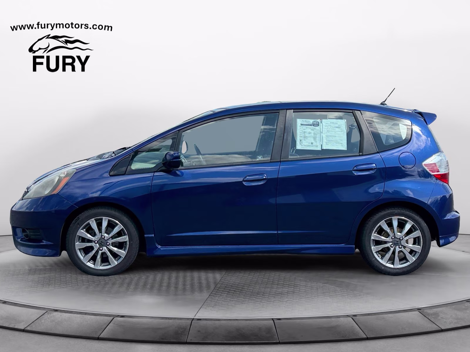 2012 Blue Honda Fit Sport FWD Hatchback