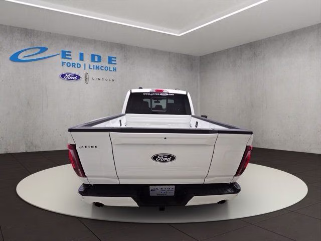 2026 Star White Metallic TC Ford F-150 Lariat Black Appearance 4X4 Truck