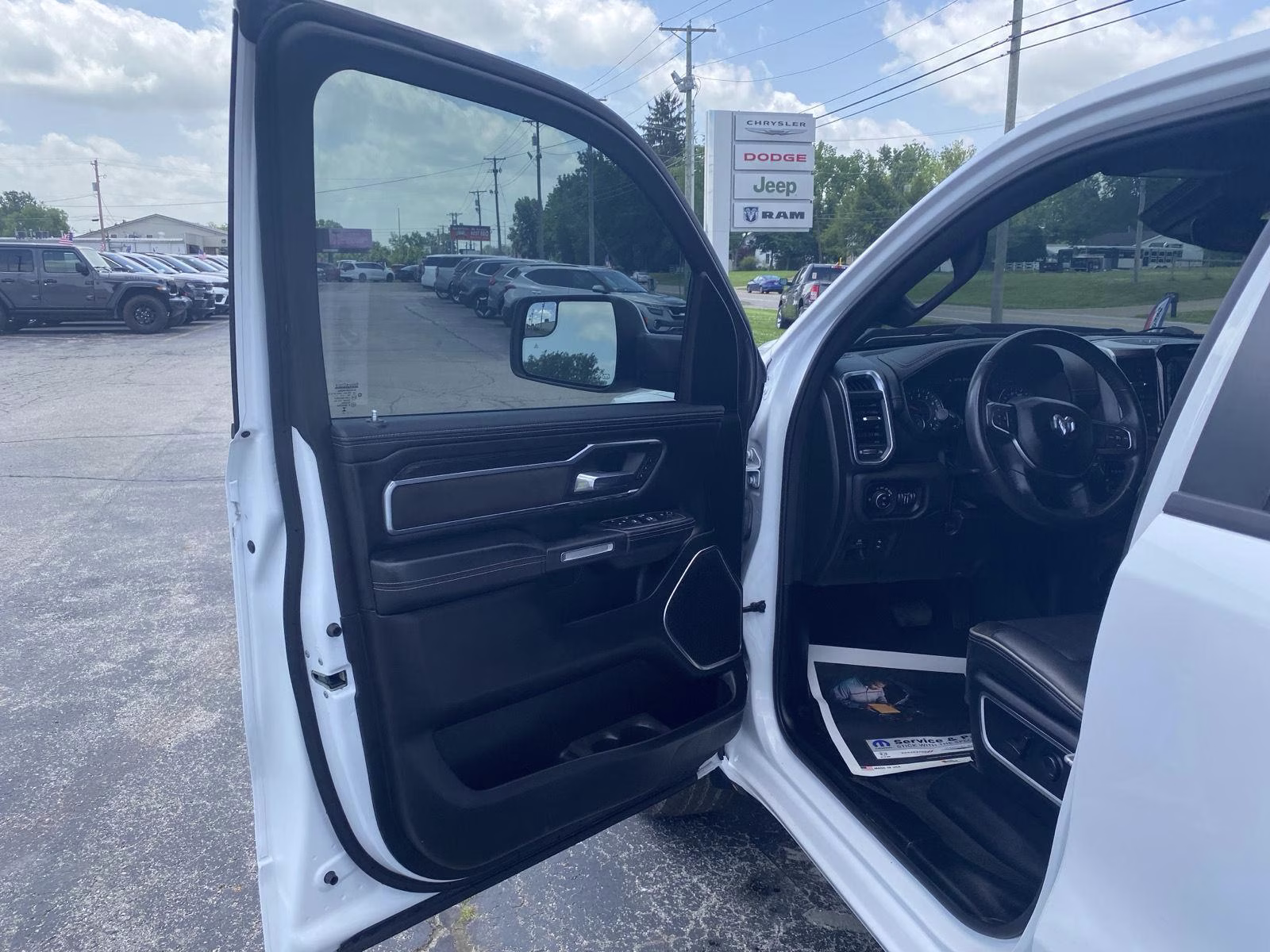 2023 Bright White Clearcoat Ram 1500 Laramie 4X4 Truck