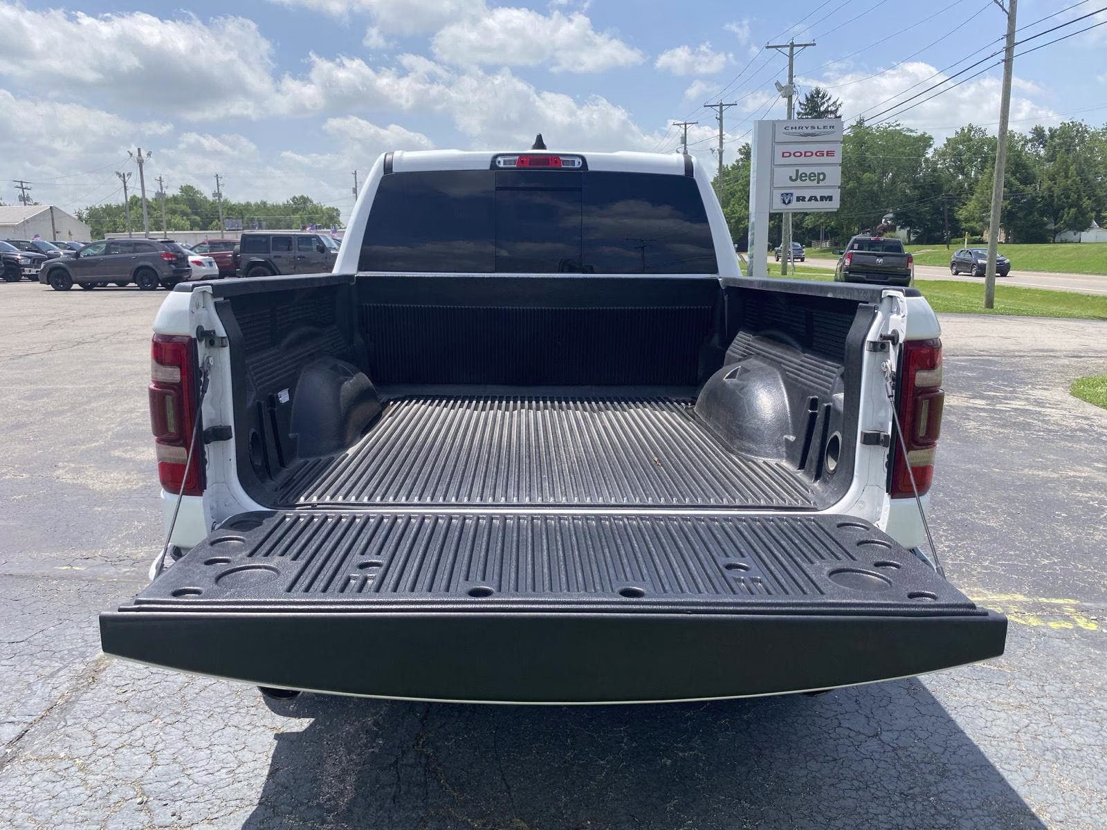 2023 Bright White Clearcoat Ram 1500 Laramie 4X4 Truck