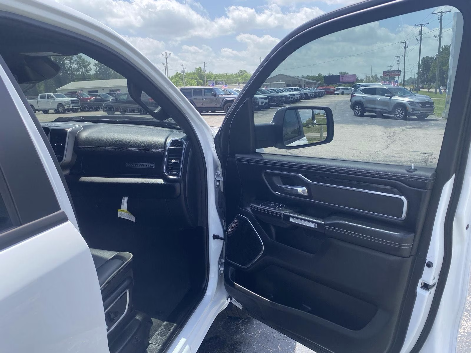 2023 Bright White Clearcoat Ram 1500 Laramie 4X4 Truck