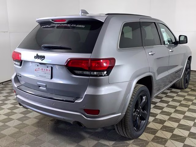 2015 Billet Silver Metallic Clearcoat Jeep Grand Cherokee Altitude 4X4 SUV
