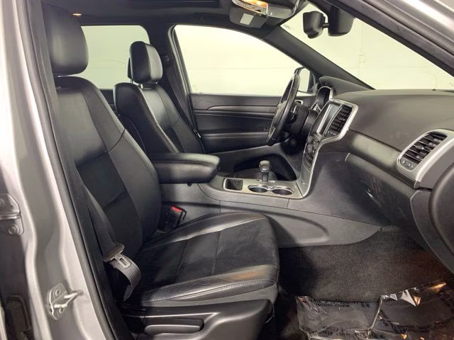 2015 Billet Silver Metallic Clearcoat Jeep Grand Cherokee Altitude 4X4 SUV