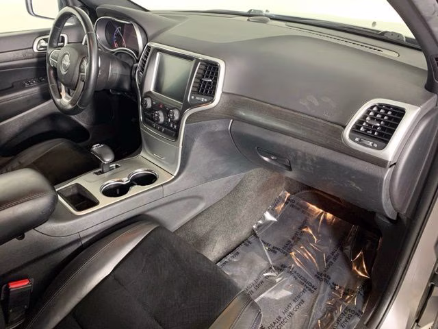 2015 Billet Silver Metallic Clearcoat Jeep Grand Cherokee Altitude 4X4 SUV