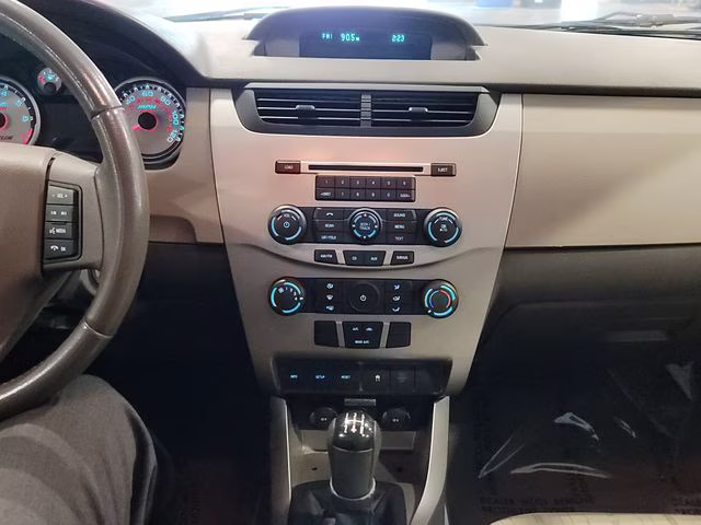 2010 Ebony Ford Focus SE FWD Sedan