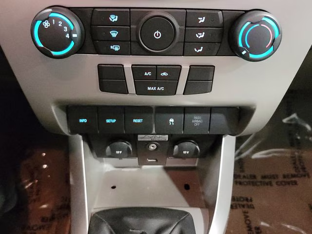 2010 Ebony Ford Focus SE FWD Sedan