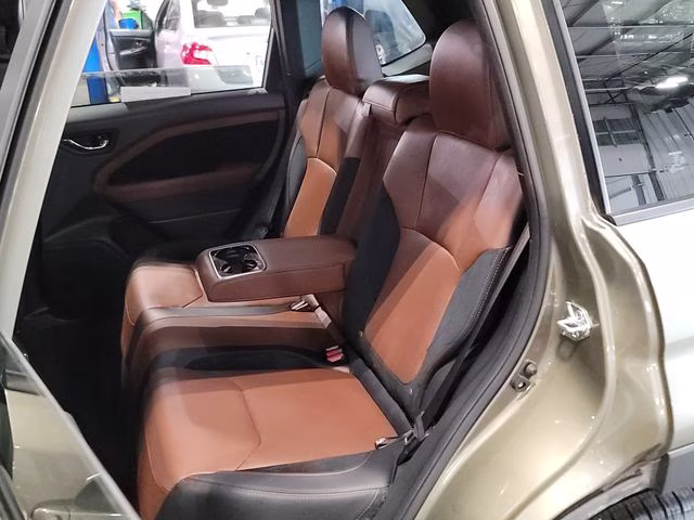 2025 Autumn Green Metallic Subaru Forester Touring AWD SUV