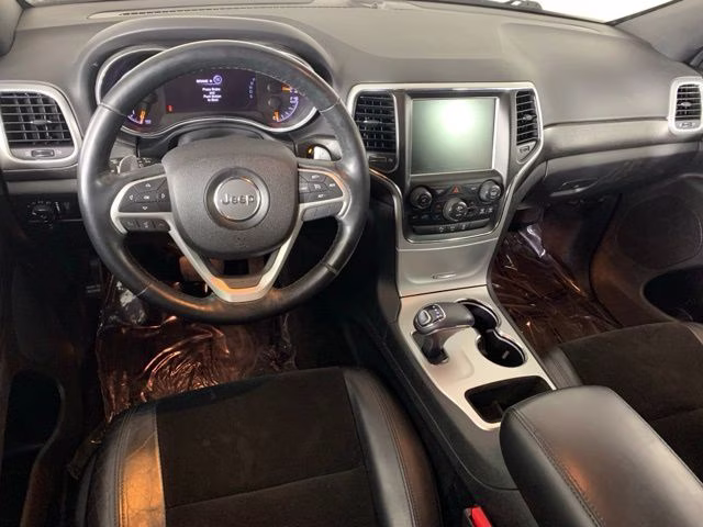 2015 Billet Silver Metallic Clearcoat Jeep Grand Cherokee Altitude 4X4 SUV