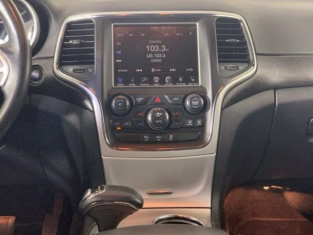 2015 Billet Silver Metallic Clearcoat Jeep Grand Cherokee Altitude 4X4 SUV