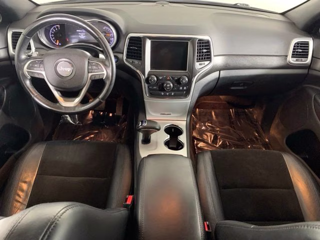 2015 Billet Silver Metallic Clearcoat Jeep Grand Cherokee Altitude 4X4 SUV