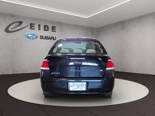 2010 Ebony Ford Focus SE FWD Sedan