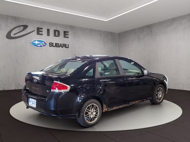 2010 Ebony Ford Focus SE FWD Sedan
