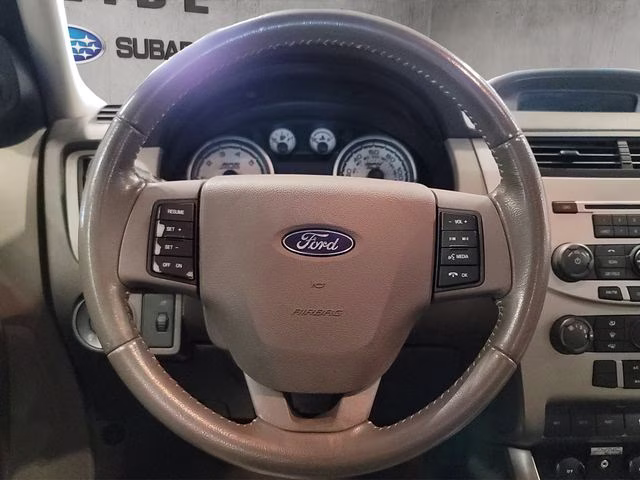 2010 Ebony Ford Focus SE FWD Sedan