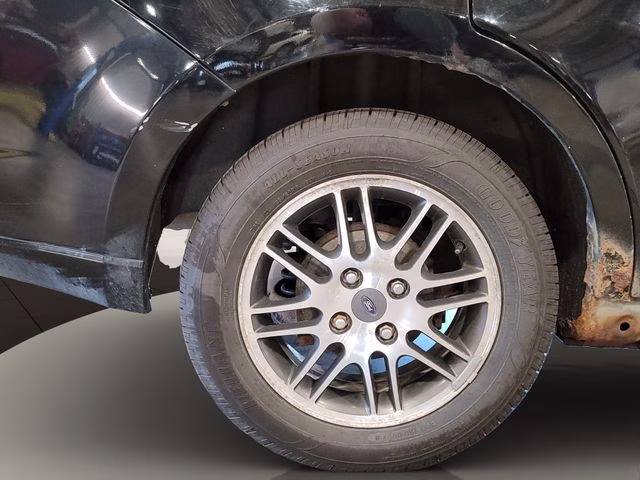 2010 Ebony Ford Focus SE FWD Sedan