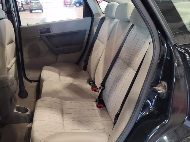 2010 Ebony Ford Focus SE FWD Sedan
