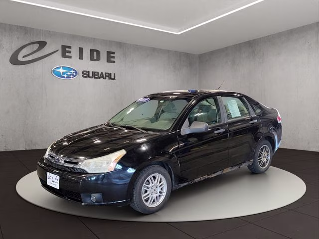 2010 Ebony Ford Focus SE FWD Sedan