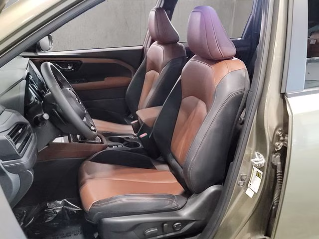 2025 Autumn Green Metallic Subaru Forester Touring AWD SUV