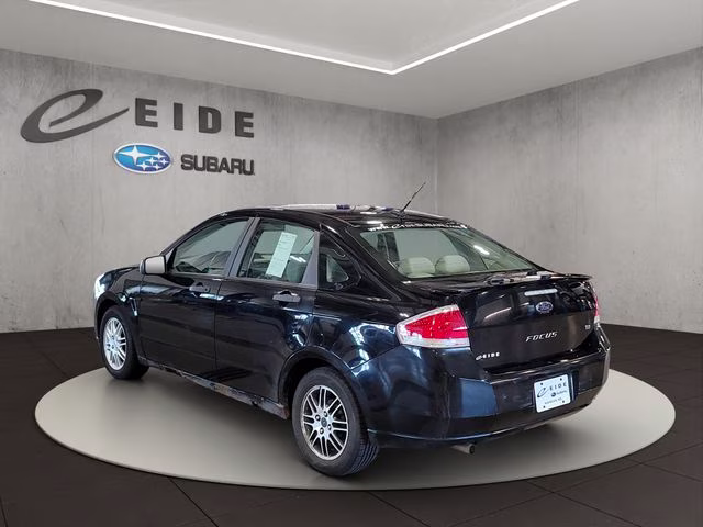 2010 Ebony Ford Focus SE FWD Sedan