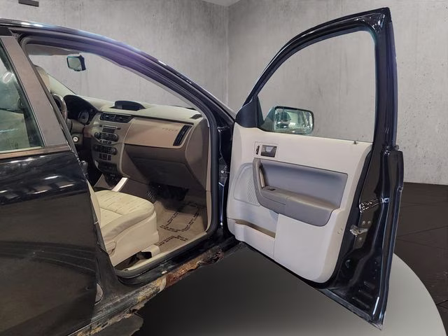 2010 Ebony Ford Focus SE FWD Sedan