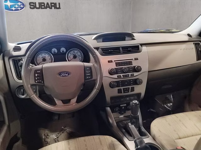 2010 Ebony Ford Focus SE FWD Sedan