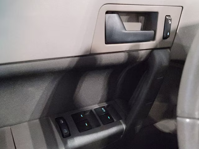 2010 Ebony Ford Focus SE FWD Sedan