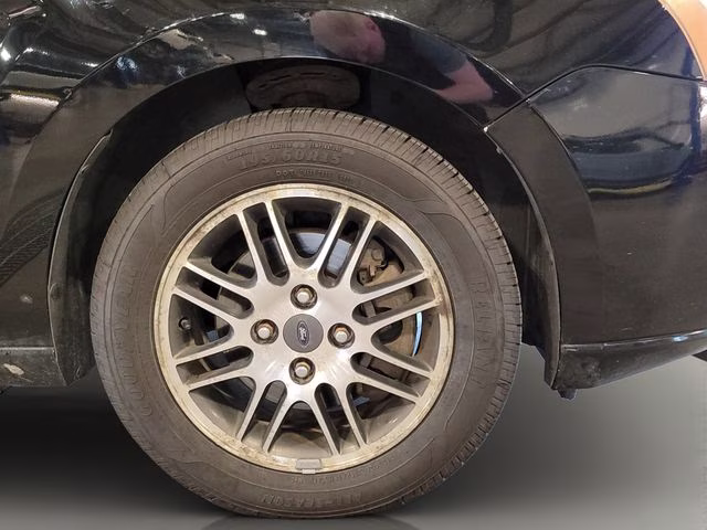 2010 Ebony Ford Focus SE FWD Sedan