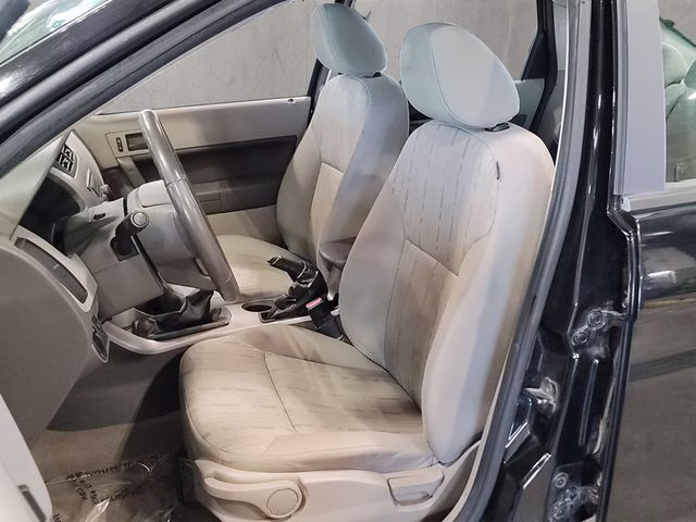 2010 Ebony Ford Focus SE FWD Sedan