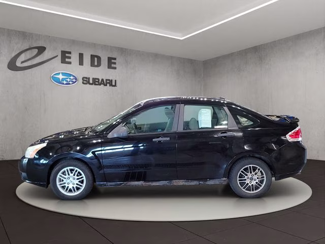 2010 Ebony Ford Focus SE FWD Sedan