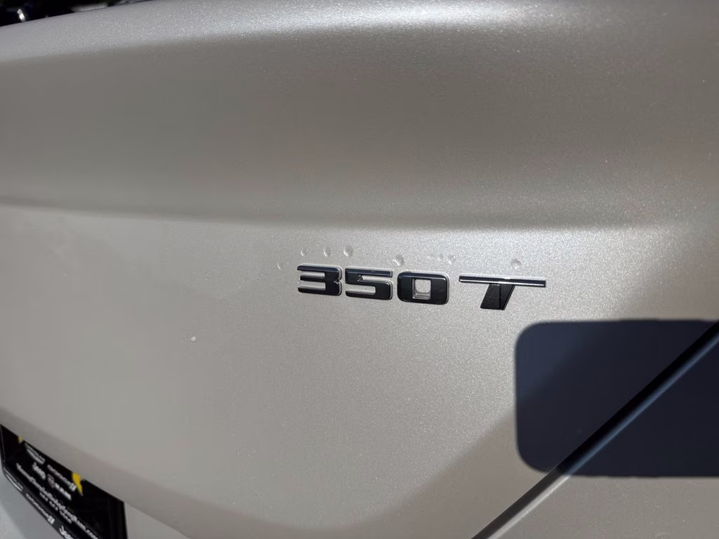2023 Crystal White Tricoat Cadillac CT4 Luxury RWD Sedan