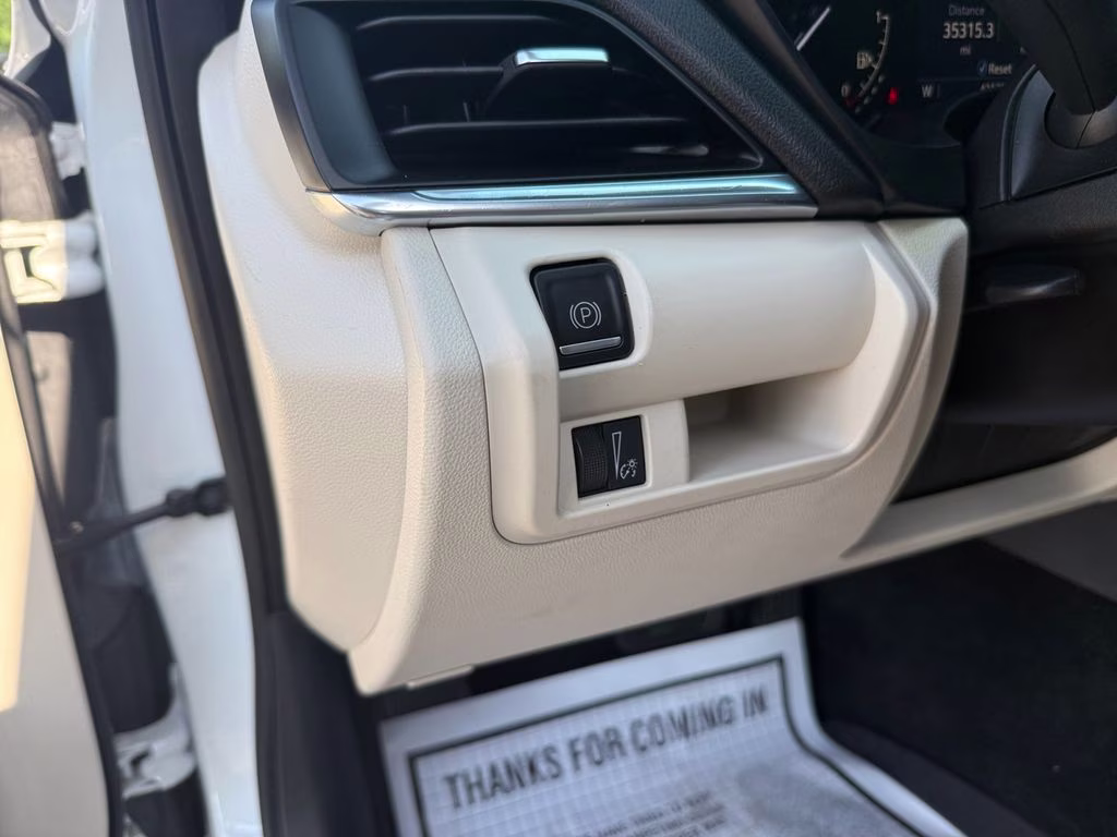 2023 Crystal White Tricoat Cadillac CT4 Luxury RWD Sedan