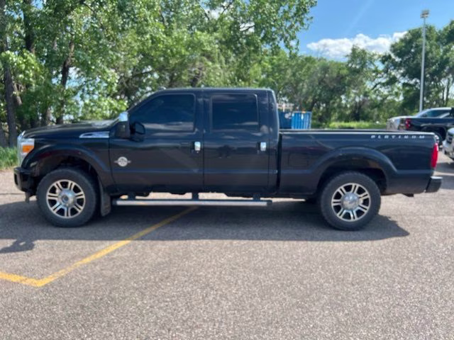 2014 Tuxedo Black Metallic Ford Super Duty F-250 SRW Platinum 4X4 Truck